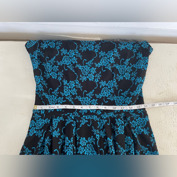Black Paper Doll Skater Dress with Blue Floral Pattern - Picture 5 of 7